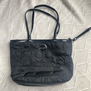 Black Coach tote bag. Quilted material. Great used condition.